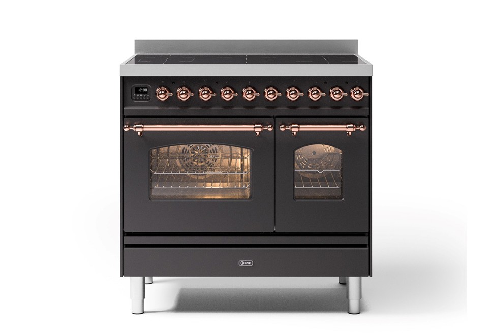 prima foto Cucina a libera installazione in acciaio con piano cottura a induzione